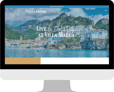 mockup image of computer with the completed Villa Marea website on it